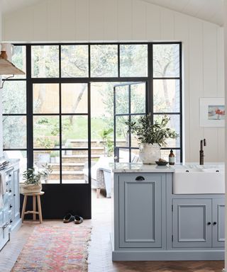 Prep sinks kitchen trend in a country-style kitchen with blue worktops