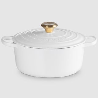 White Le creuset cast iron casserole dish