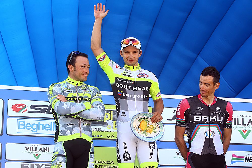 Jakub Mareczko (Southeast) on the top step of the podium at Coppi e Bartali