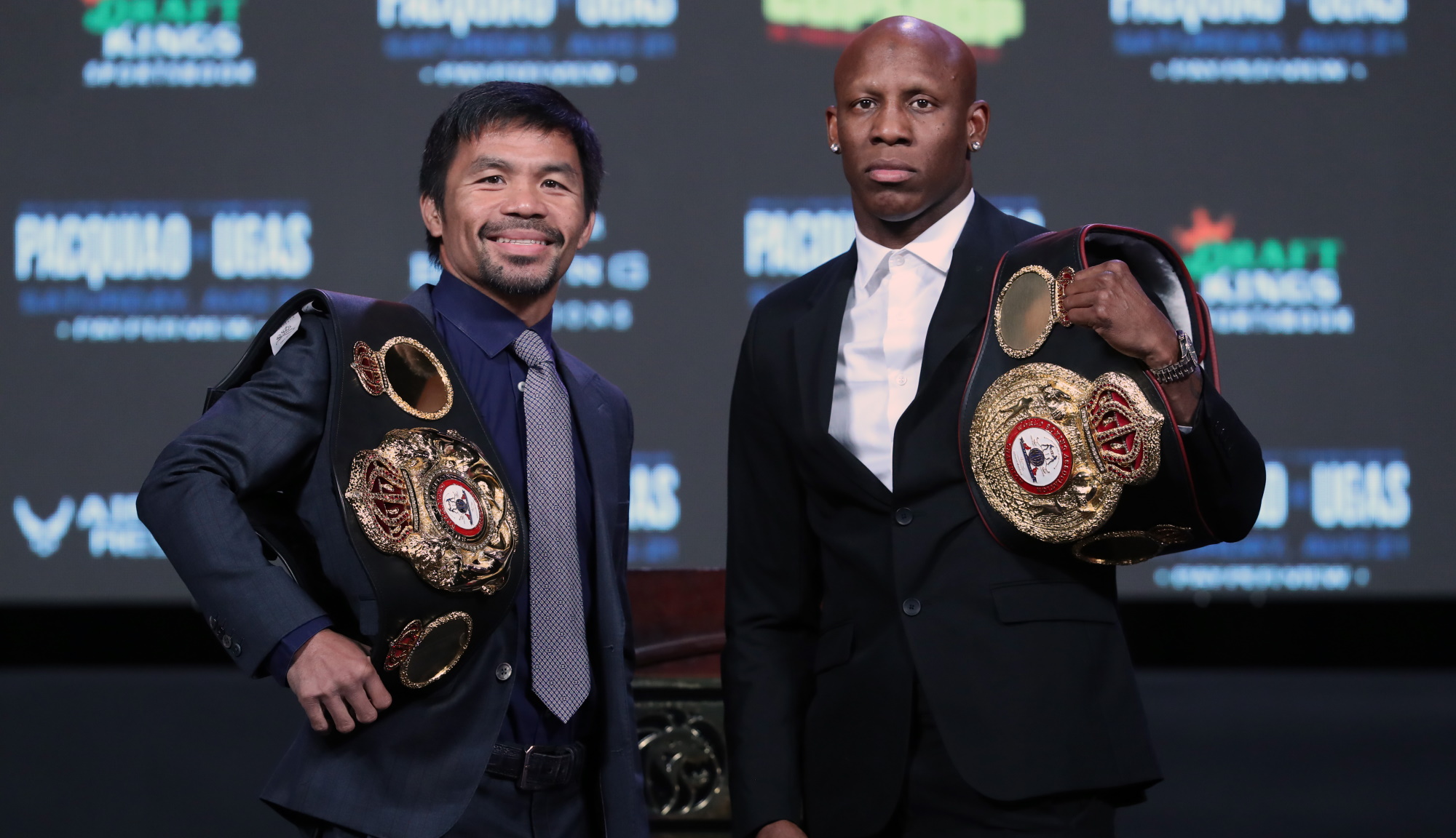 Manny Pacquiao and Yordenis Ugas posing before their fight