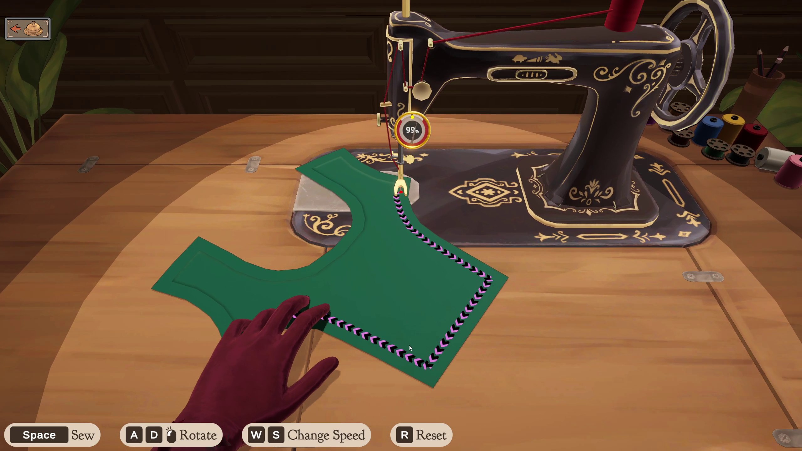Dressmaker - Sewing the top part of a green silk dress