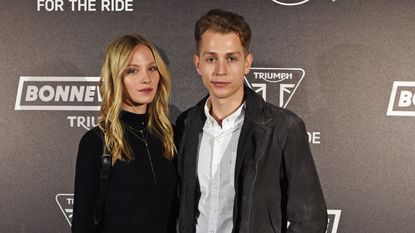 Kirstie Brittain (L) and James McVey attend the Global VIP Reveal of the new Triumph Bonneville Bobber on October 19, 2016 in London, England.