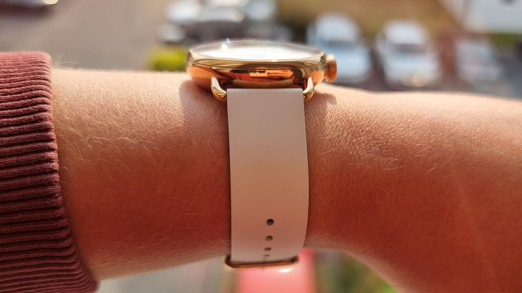 a close-up picture of our reviewer wearing the Withings ScanWatch 2, view from the side
