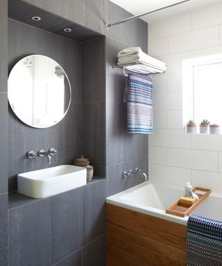 bathroom with charcoal grey slate wall