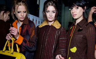 Female models dressed in the Missoni A/W 2014 backstage of the fashion show