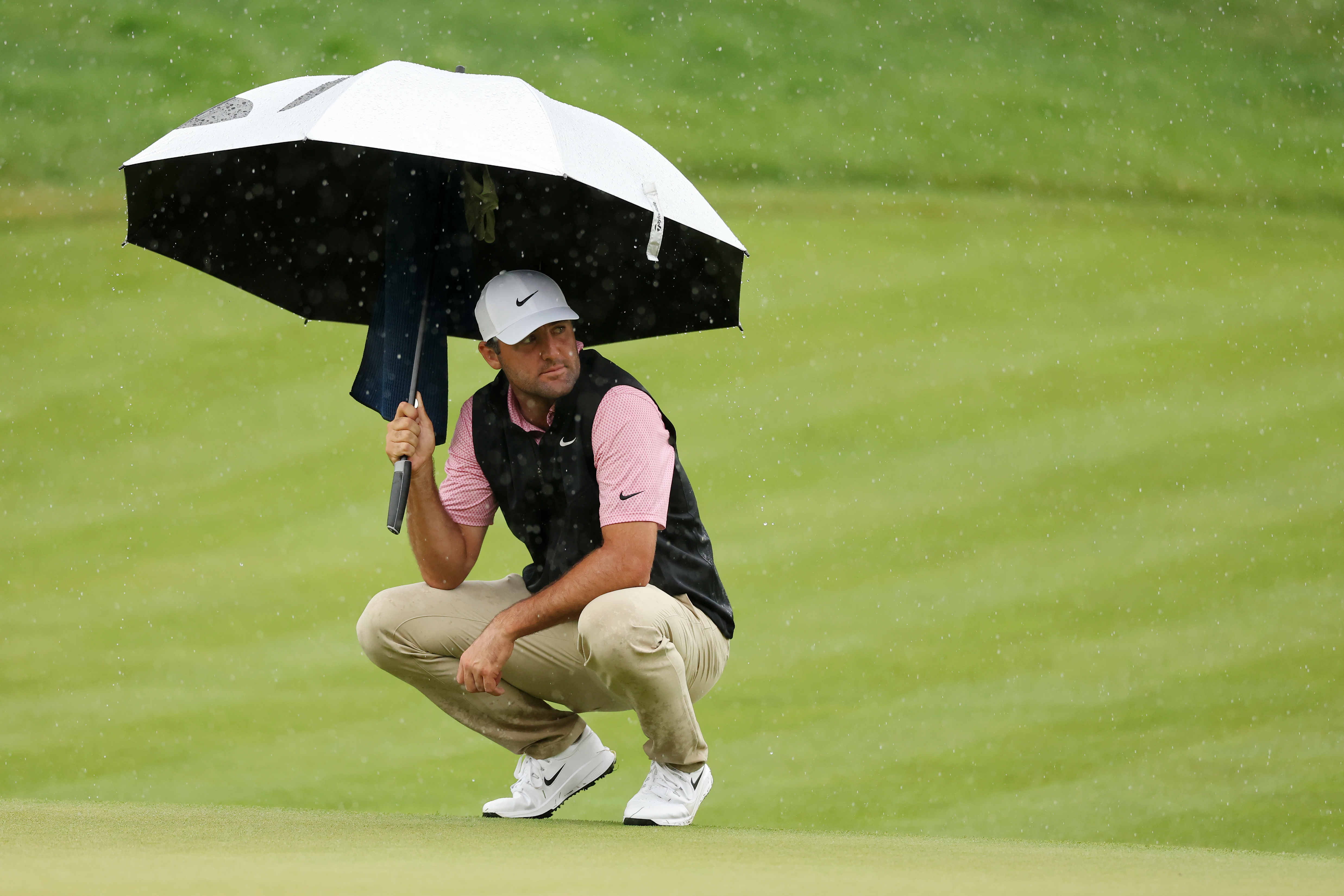 Scottie Scheffler looks on from the 13th green during the final round of the Travelers Championship
