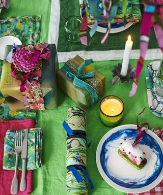 Colorful bright christmas table with presents and decorations