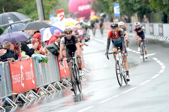 Trek Factory Racing teammates Jens Voigt and Fr&auml;nk Schleck ride into the stage 19 finish line