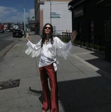 Laura Angelone wearing a silk scarf