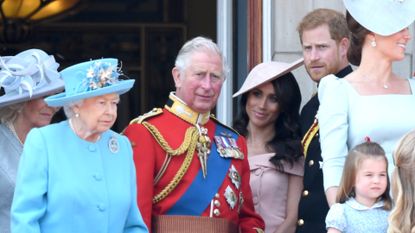 Queen Elizabeth II, Prince Charles, Prince of Wales, Meghan, Duchess of Sussex, Prince Harry, Duke of Sussex, Catherine, Duchess of Cambridge and Princess Charlotte of Cambridge on the balcony of Buckingham Palace during Trooping The Colour 2018 at The Mall on June 9, 2018 in London, England. The annual ceremony involving over 1400 guardsmen and cavalry, is believed to have first been performed during the reign of King Charles II. The parade marks the official birthday of the Sovereign, even though the Queen's actual birthday is on April 21st.