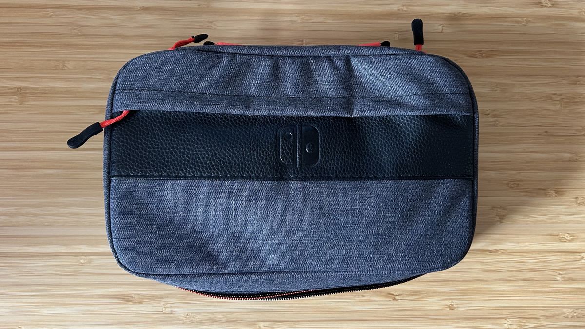 PDP messenger case closed on a wooden table