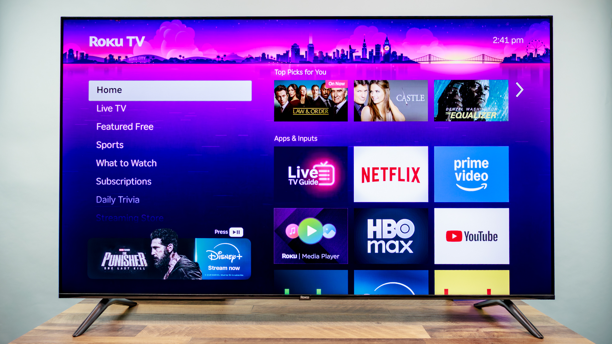 Roku 65-inch Class Select Series 4K QLED (2026) TV on a desk