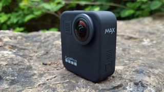 The GoPro Max camera on a rock