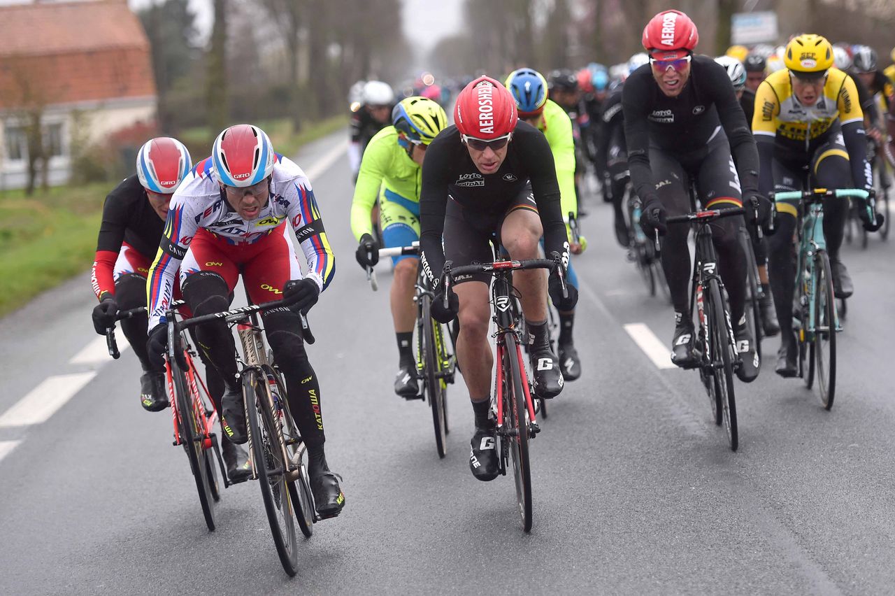 Riders try to stay upright in the strong winds