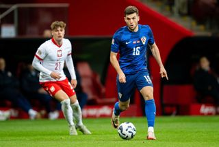 WARSAW, POLAND - OCTOBER 15: Martin Baturina of Croatia controls the ball during the UEFA Nations League 2024/25 League A Group A1 match between Poland and Croatia at the National Stadium on October 15, 2024 in Warsaw, Poland. (Photo by Mateusz Slodkowski/Getty Images)