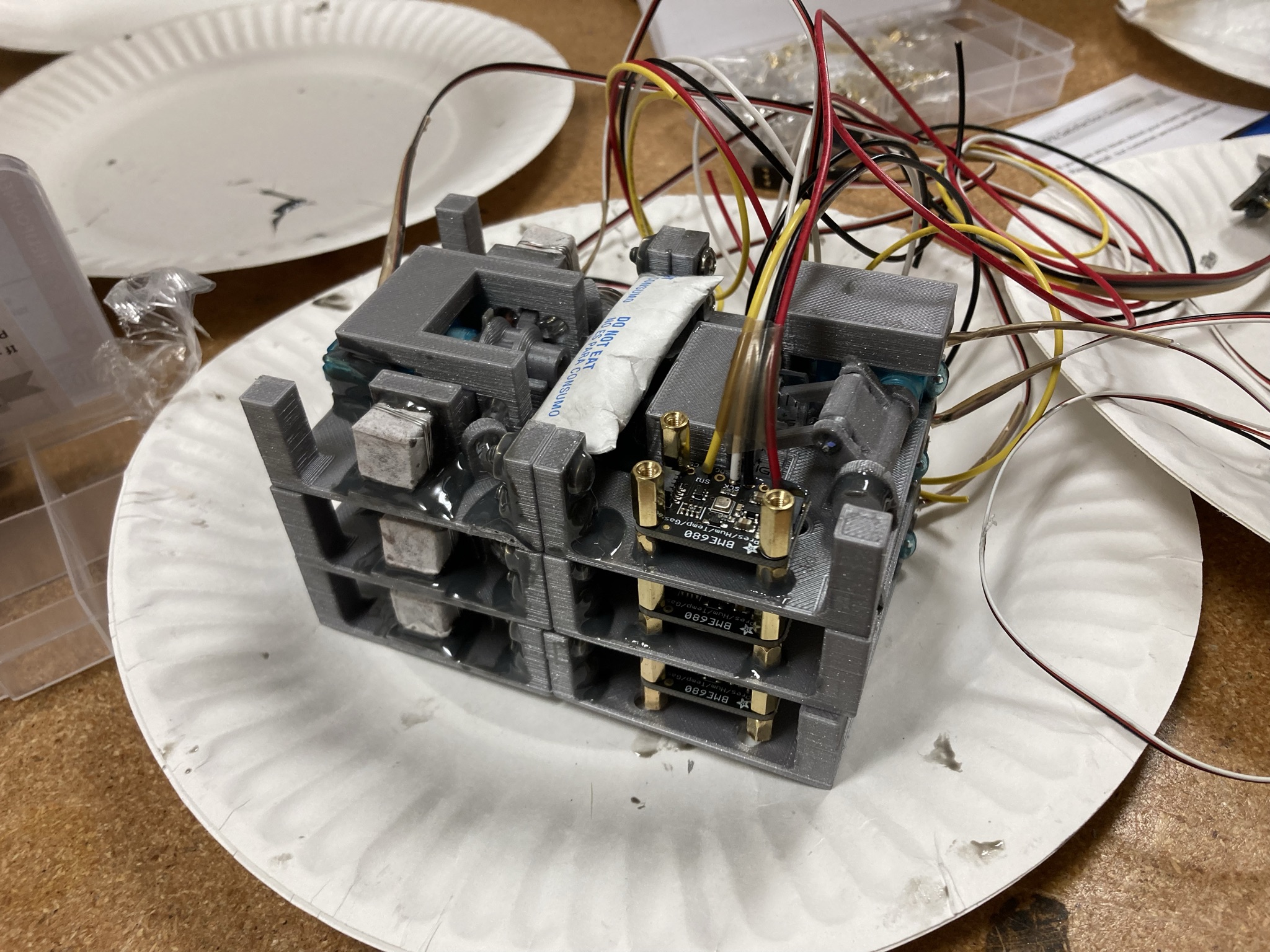 Flight hardware for the Biopolymer Research for In-Situ Capabilities, an investigation of how microgravity affects the process of creating a concrete alternative made with an organic material and on-site materials such as lunar or Martian dust. Each module makes two bricks, for a total of six bricks made in space.