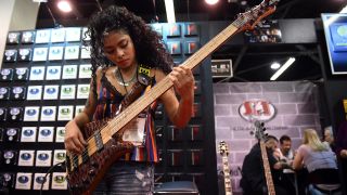 India bass prodigy, Mohini Dey, plays for an artist demo at the SIT Strings booth during the NAMM Show on January 25, 2019, at the Anaheim Convention Center in Anaheim, CA