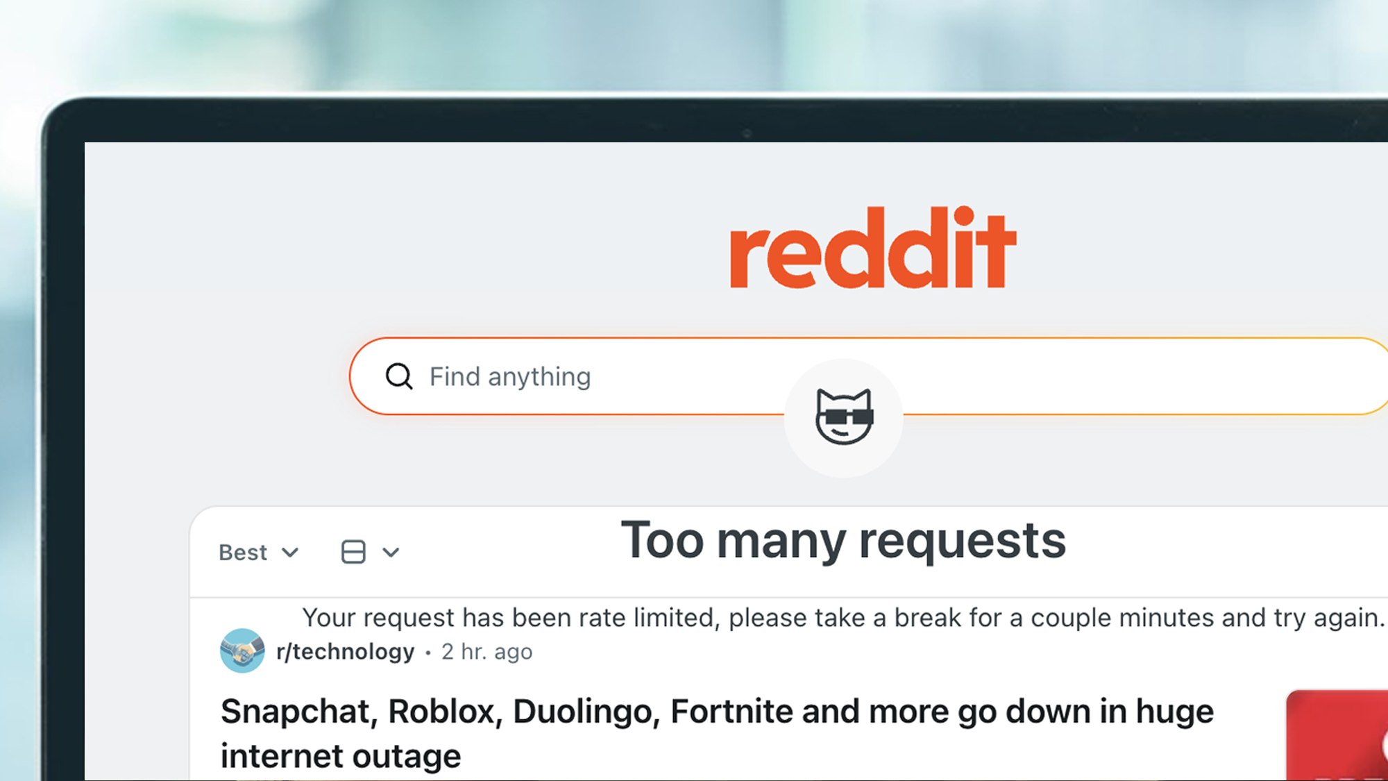 A laptop screen showing issues with the Reddit website