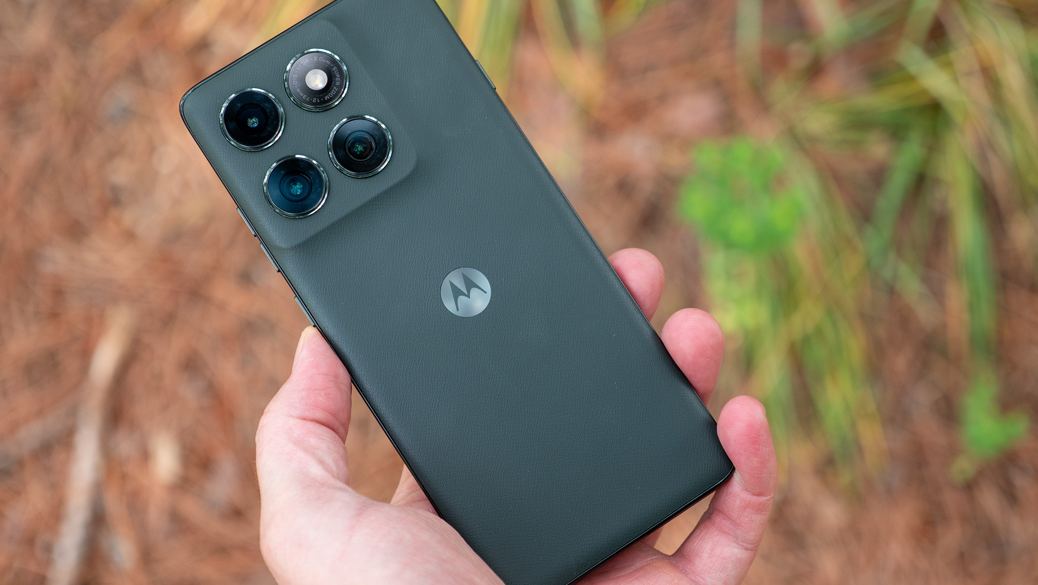 The vegan leather back of the forest green Motorola Edge 2025