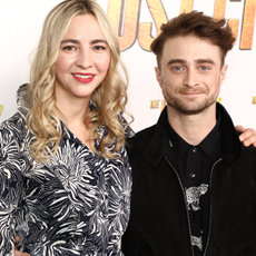 Erin Darke and Daniel Radcliffe attend a screening of "The Lost City" at the Whitby Hotel on March 14, 2022 in New York City.