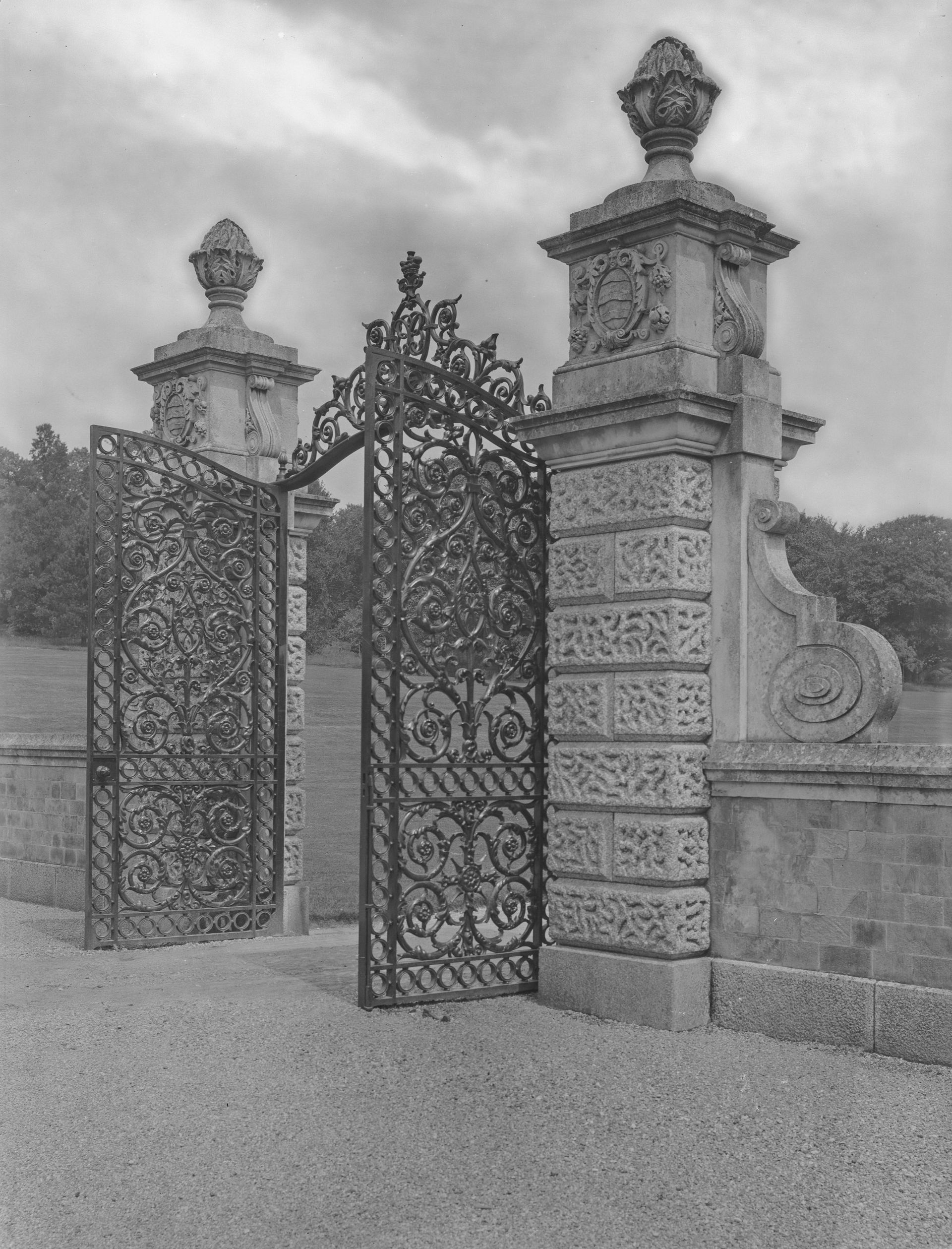 Black-and-white photographs of a neo-Palladian manor house