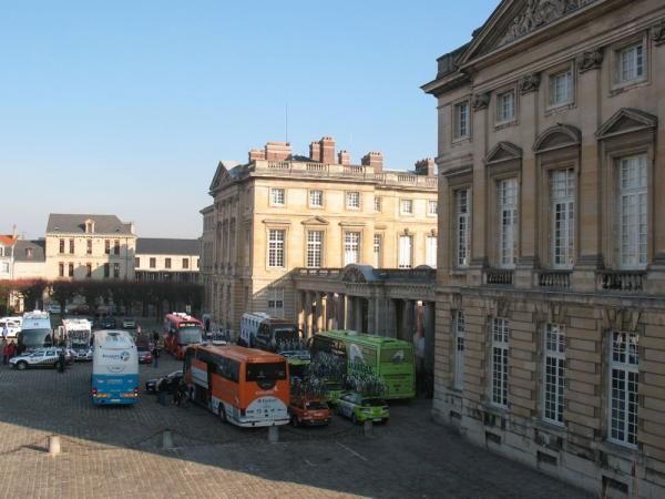 The team buses are parking in the shadow of Napoleon's chateau in Compiegne