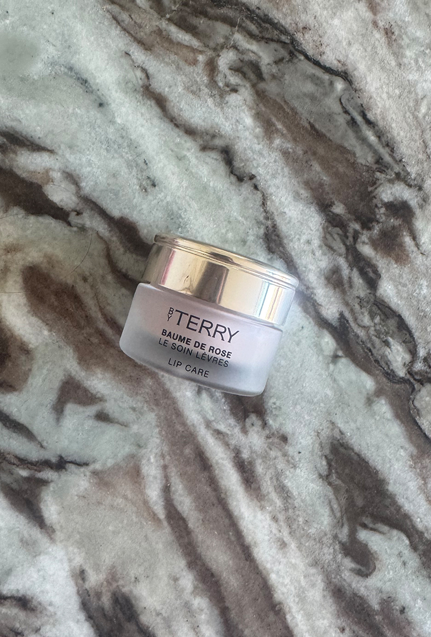 By Terry Baume De Rose lip balm on marble table
