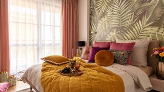 Sunset shades in a bedroom from Dekoria illustrating one of the big color trends 2023