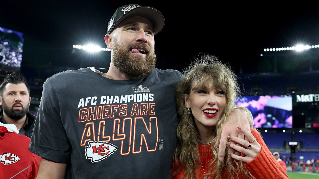 Travis Kelce #87 of the Kansas City Chiefs celebrates with Taylor Swift after a 17-10 victory against the Baltimore Ravens in the AFC Championship Game at M&amp;T Bank Stadium on January 28, 2024 in Baltimore, Maryland.