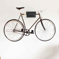 bicycle hung on bike shelf