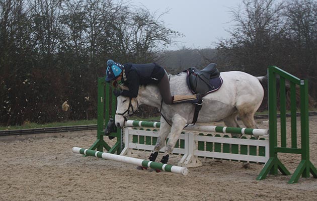 &ldquo;This is a picture of myself and my horse Ralph very nearly parting company a couple of weeks ago (everyone, including myself, was extremely surprised that I stayed on). We weren&rsquo;t on a very good stride going into the jump so would either have to go on a long one or chip in a short one. I prefer to go on a long stride, so asked Ralph for this to which he responded, however he started to doubt this so reconsidered, but ended up kind of falling over the top of the jump&rdquo; &mdash; Megan Borland (and Wreck It Ralph)