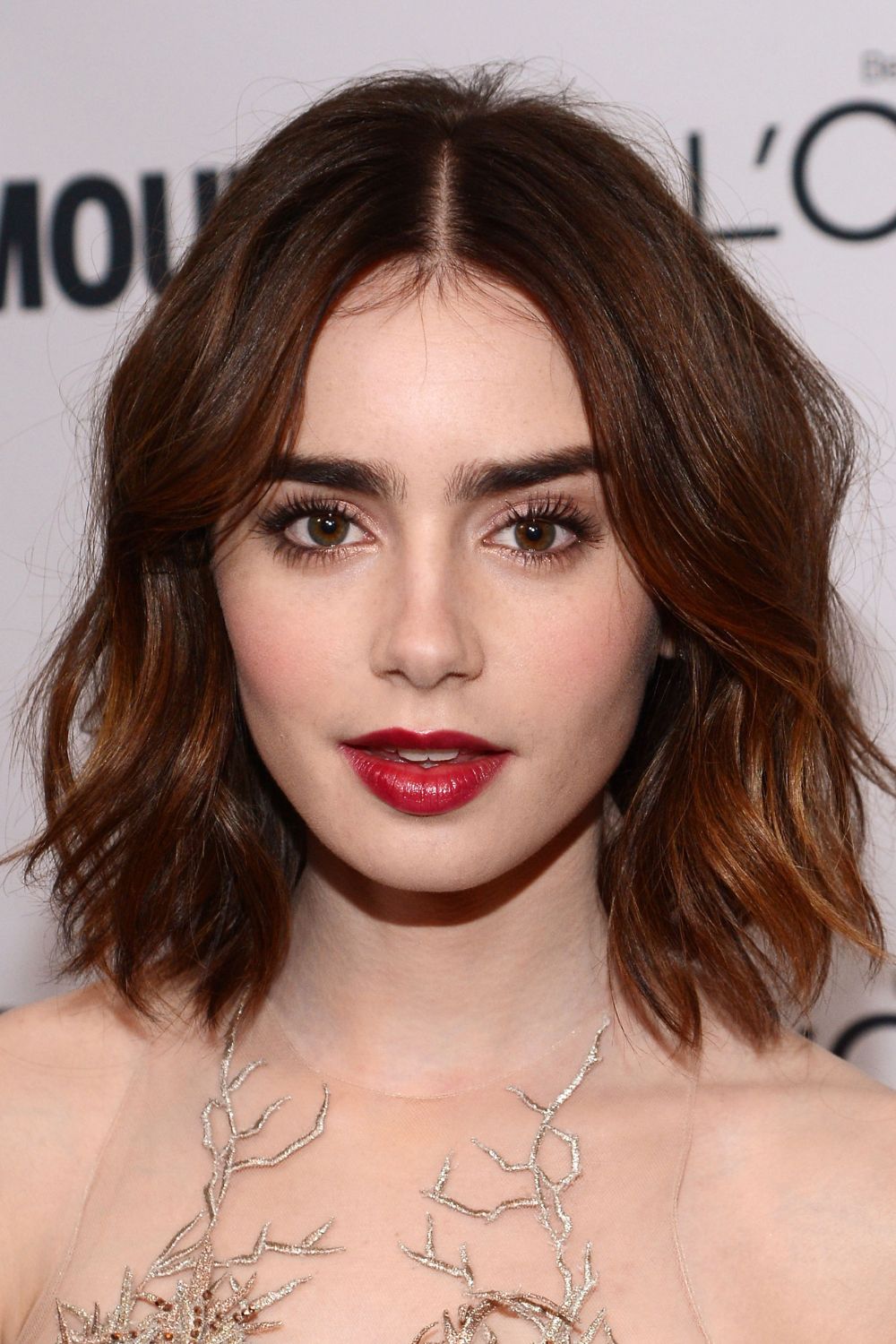 Lily Collins with a thickening haircut