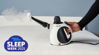 Koitat mattress steam cleaner on white mattress with steam coming out 