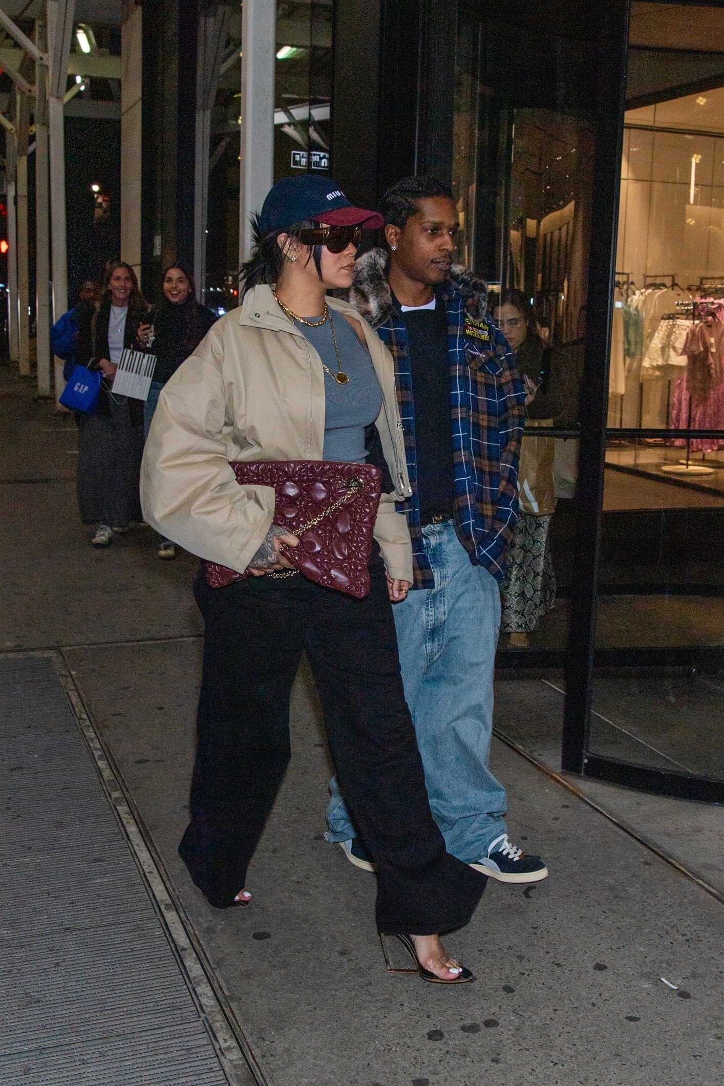 Rihanna wore the naked sandals trend with a Dior bag and camel coat