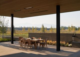 Outdoor seating and view of landscape at Black Fox Ranch, CLB Architects