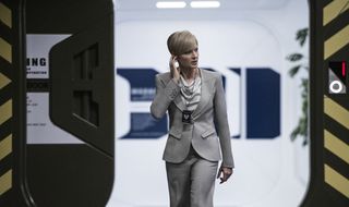 Jodie Foster Listens to an Earpiece in 'Elysium'