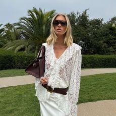 Elsa Hosk wearing a lace top