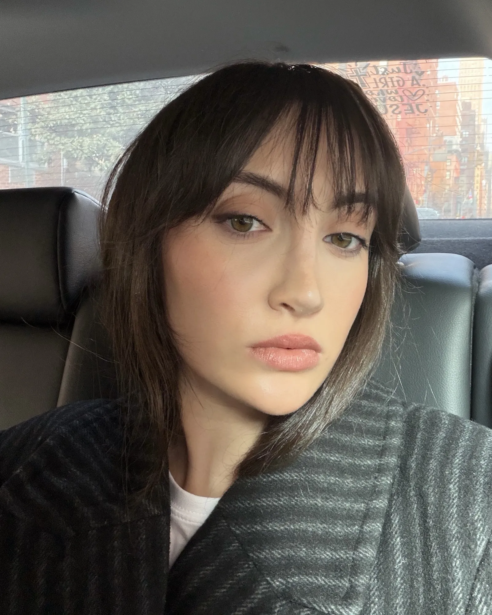 An image of WWW associate beauty editor Alyssa Brascia wearing the M.Ph Le Skin Weightless Serum Foundation.