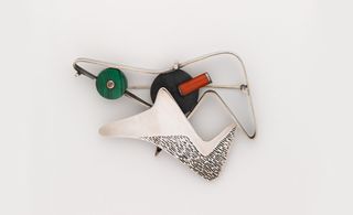 Abstract pendant resembling a guitar