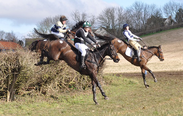 At the 12th fence Heather Moodie (right) leads Ben Tuckey with winner Dominic Gwyn-Jones waiting to make a move