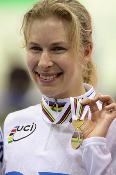 Sarah Hammer (USA) proudly displays the gold medal she won in the women's 3,000m individual pursuit.