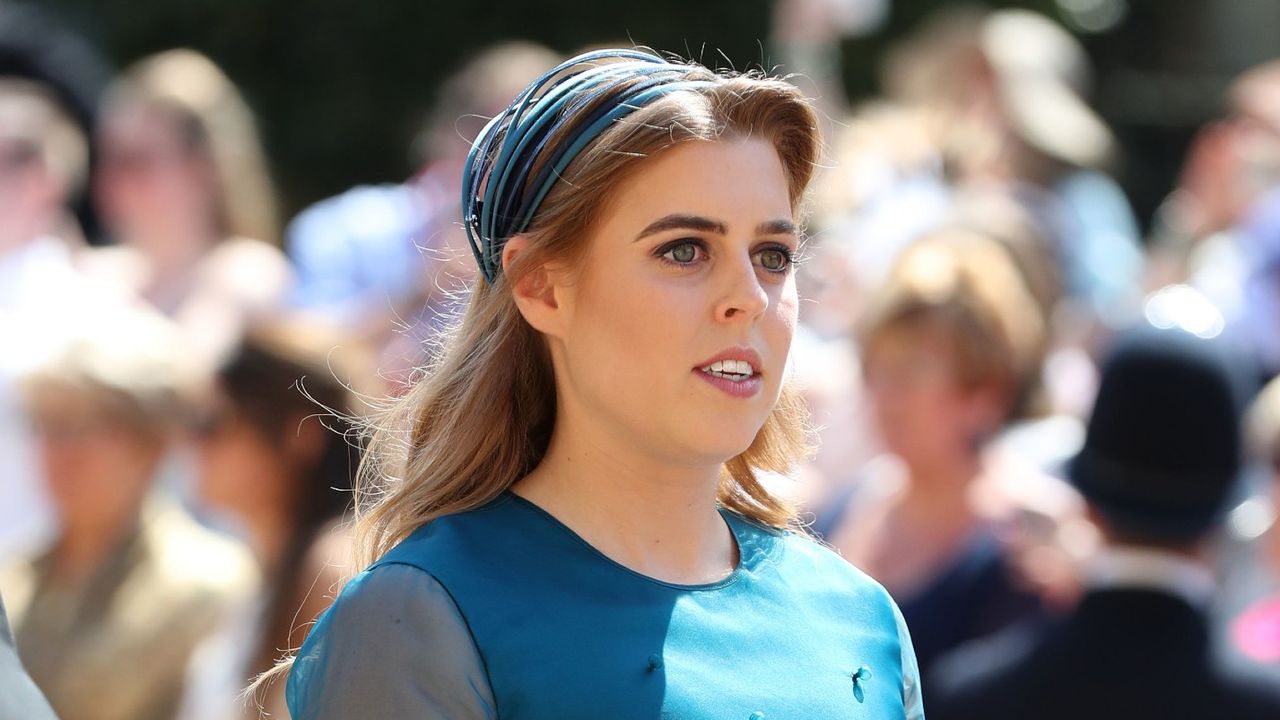 Princess Beatrice arrives at St George&#039;s Chapel at Windsor Castle before the wedding of Prince Harry to Meghan Markle on May 19, 2018 in Windsor, England