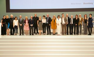 The people who spoke at the forum, lined up on the stage