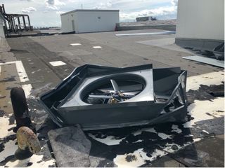 A fan detached and damaged by Hurricane Ida as seen on the roof of the main manufacturing building at NASA's Michoud Assembly Facility in New Orleans.