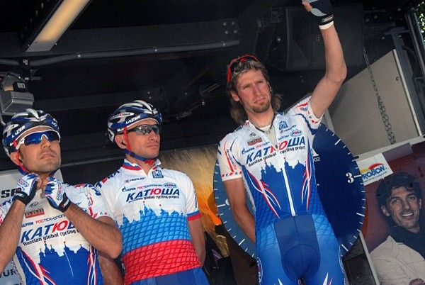 Serguei Ivanov (L) and Vladimir Karpets of Team Katusha are introduced prior to the start of stage five.