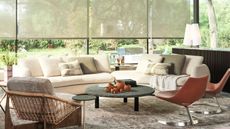 living room with white sofa and round coffee table