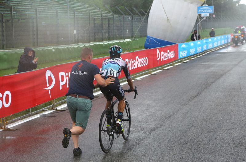 Rigoberto Uran (Etixx-Quick Step) gets a push after crashing on the circuit