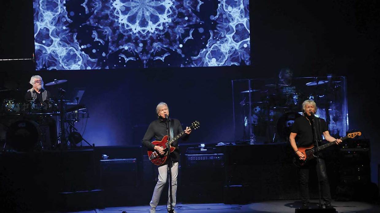 Justin Hayward, Graeme Edge and John Lodge from The Moody Blues live on stage in the USA