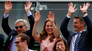 Michael Middleton and Kate Middleton doing a mexican wave