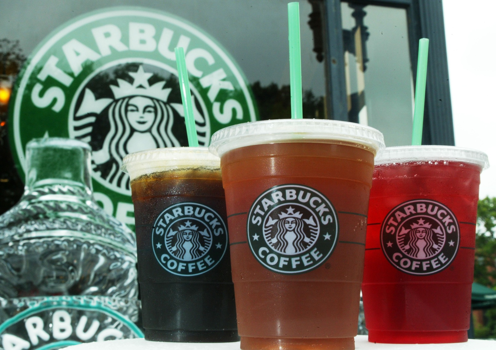 WASHINGTON - JULY 2: Starbucks' new iced coffee and tea beverages are displayed during a promotion July 2, 2003 outside a Starbucks coffee shop at Dupont Circle in Washington, DC. Starbucks introduced a new line of iced tea, coffee and tea lemonade drinks to their customers to cool down in the summer. (Photo by Alex Wong/Getty Images)